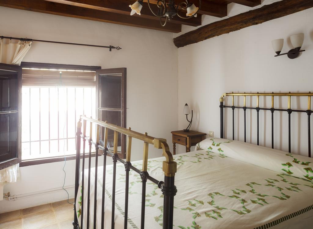 La Casa Del Tio Venancio Hostal Caracenilla Habitación foto